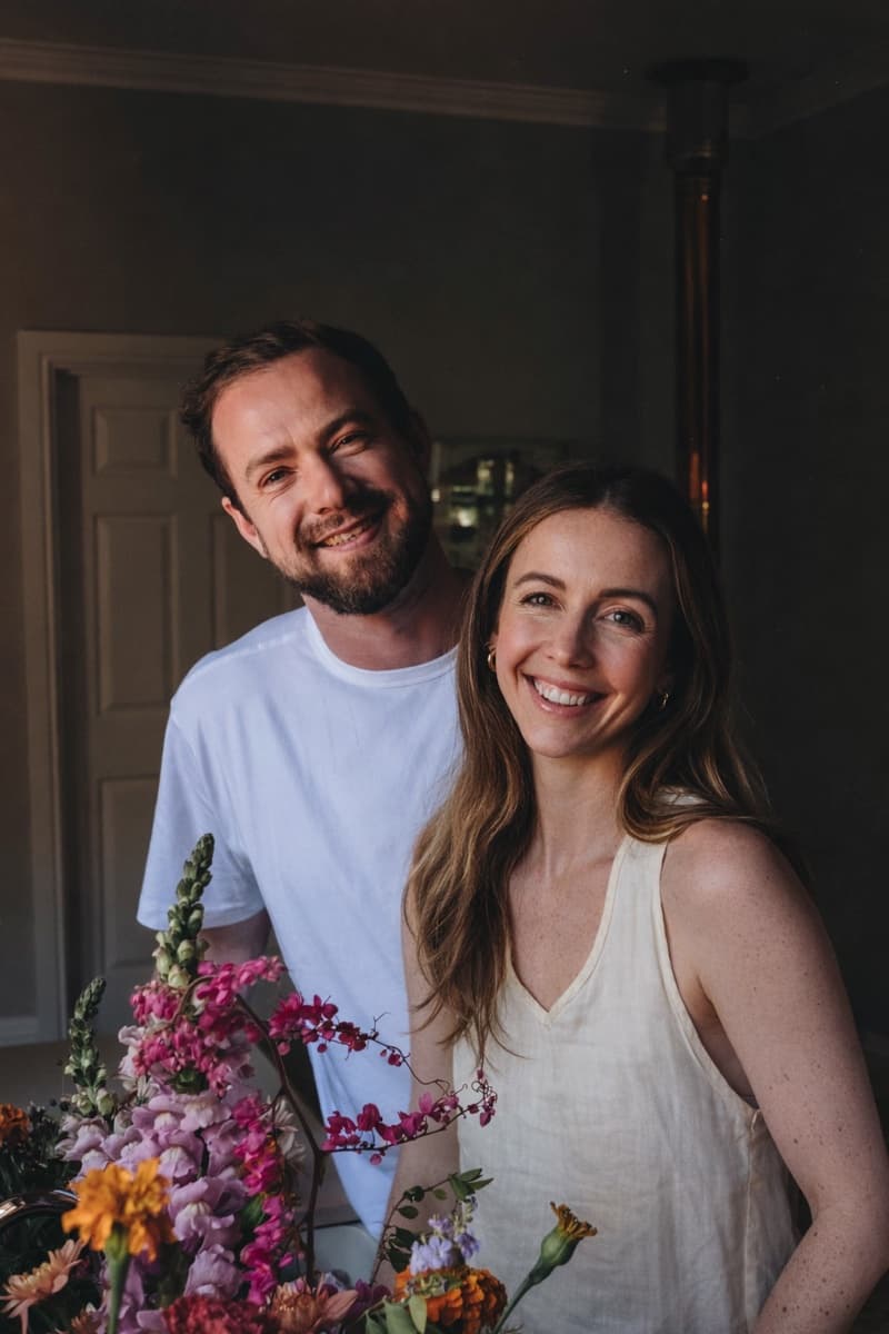Dylan and Pippa, the founders of BloomBoard, with an armful of flowers